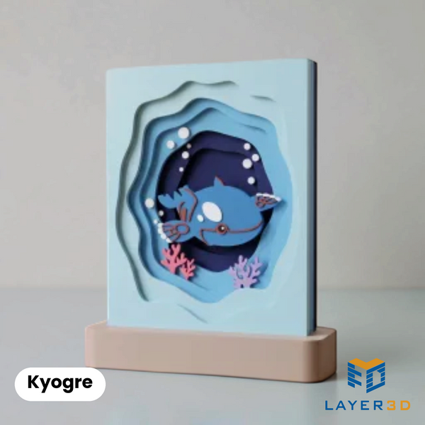 Kyogre layered 3D printed shadowbox on a display base, hand-finished desk decor by Layer3D