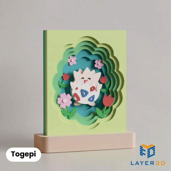 Togepi layered 3D printed shadowbox on a display base, hand-finished desk decor by Layer3D