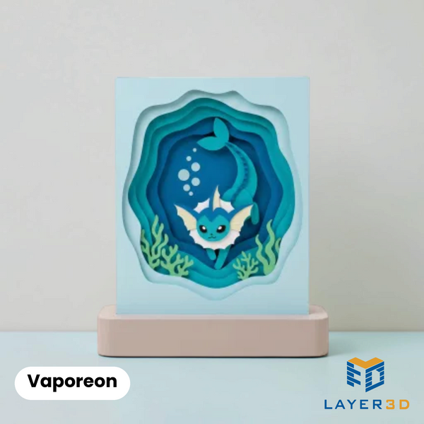 Vaporeon layered 3D printed shadowbox on a display base, hand-finished desk decor by Layer3D